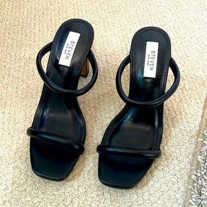 Never worn Steven New York black slip on heels